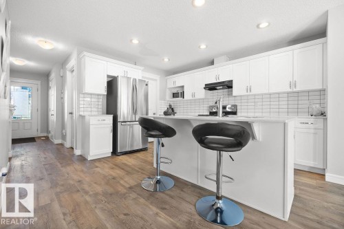 9053 Cooper Link Link, Edmonton, AB - Indoor Photo Showing Kitchen With Double Sink With Upgraded Kitchen
