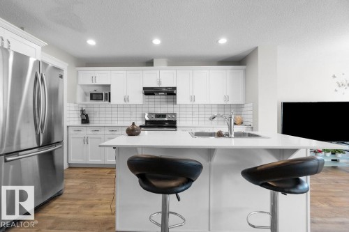 9053 Cooper Link Link, Edmonton, AB - Indoor Photo Showing Kitchen With Double Sink With Upgraded Kitchen