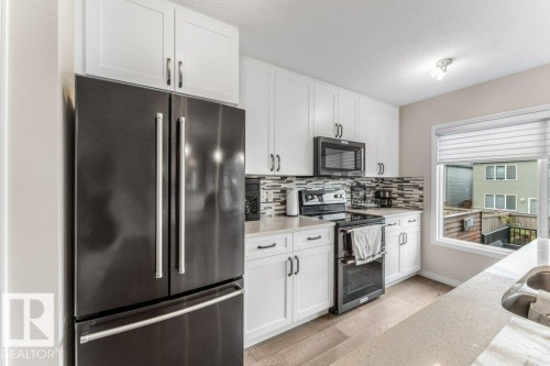 2104 Price Landing Landing, Edmonton, AB - Indoor Photo Showing Kitchen With Stainless Steel Kitchen With Double Sink With Upgraded Kitchen