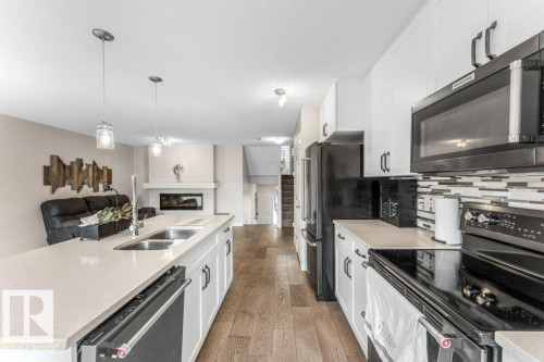 2104 Price Landing Landing, Edmonton, AB - Indoor Photo Showing Kitchen With Stainless Steel Kitchen With Double Sink With Upgraded Kitchen