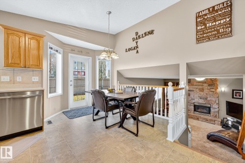 8304 170 Avenue, Edmonton, AB - Indoor Photo Showing Dining Room With Fireplace