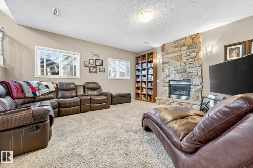 8304 170 Avenue, Edmonton, AB - Indoor Photo Showing Living Room With Fireplace