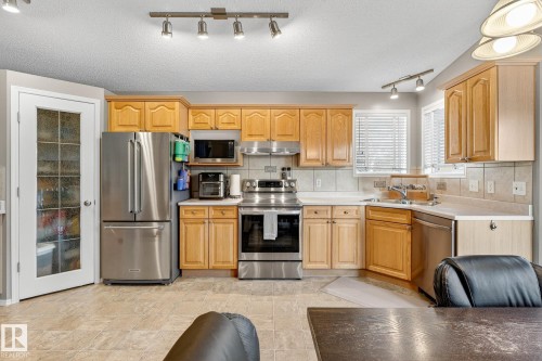 8304 170 Avenue, Edmonton, AB - Indoor Photo Showing Kitchen With Double Sink