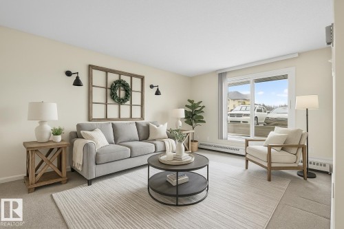 131 9620 174 Street, Edmonton, AB - Indoor Photo Showing Living Room