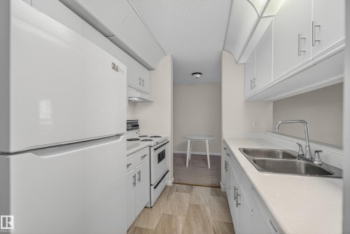 131 9620 174 Street, Edmonton, AB - Indoor Photo Showing Kitchen With Double Sink