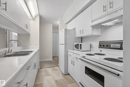 131 9620 174 Street, Edmonton, AB - Indoor Photo Showing Kitchen With Double Sink