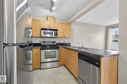 71 230 Edwards Drive, Edmonton, AB - Indoor Photo Showing Kitchen With Double Sink
