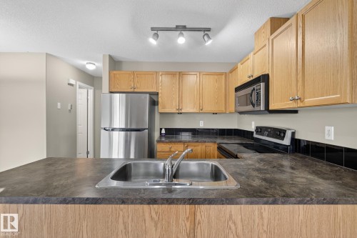 71 230 Edwards Drive, Edmonton, AB - Indoor Photo Showing Kitchen With Double Sink