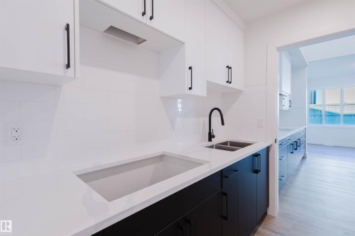1570 Siskin Link, Edmonton, AB - Indoor Photo Showing Kitchen With Double Sink With Upgraded Kitchen