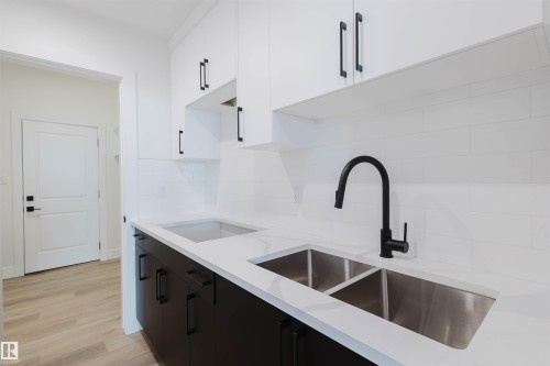 1570 Siskin Link, Edmonton, AB - Indoor Photo Showing Kitchen With Double Sink
