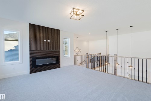 1570 Siskin Link, Edmonton, AB - Indoor With Fireplace