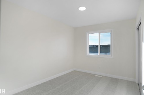 83 Ficus Way, Fort Saskatchewan, AB - Indoor Photo Showing Other Room
