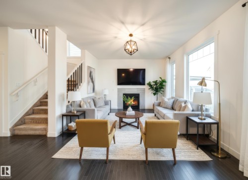 5737 Greenough Landing Landing, Edmonton, AB - Indoor Photo Showing Living Room With Fireplace
