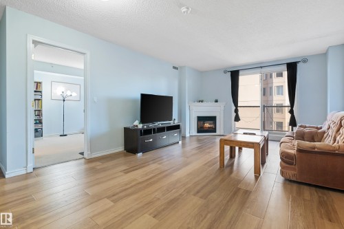 1102 10909 103 Avenue, Edmonton, AB - Indoor Photo Showing Living Room With Fireplace