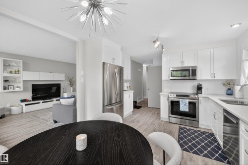 7719 71 Avenue, Edmonton, AB - Indoor Photo Showing Kitchen With Double Sink