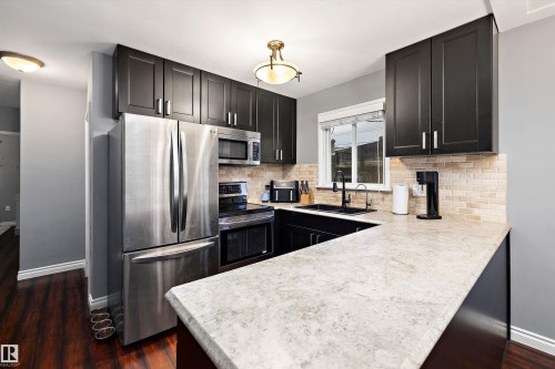 12039 52 Street, Edmonton, AB - Indoor Photo Showing Kitchen With Stainless Steel Kitchen With Double Sink With Upgraded Kitchen