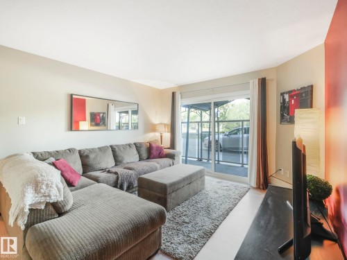 102 9715 110 Street, Edmonton, AB - Indoor Photo Showing Living Room