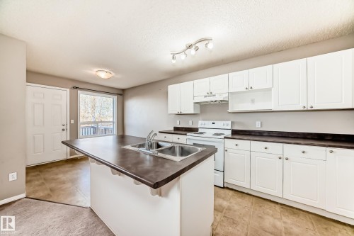12 Graywood Terrace, Stony Plain, AB - Indoor Photo Showing Kitchen With Double Sink