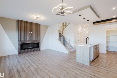 339 Munn Way, Leduc, AB - Indoor Photo Showing Other Room With Fireplace