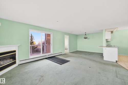301 10511 42 Avenue, Edmonton, AB - Indoor With Fireplace