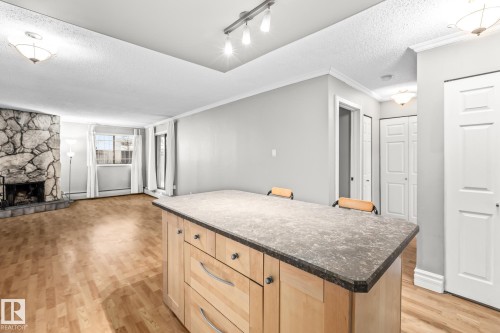 G7 10148 118 Street, Edmonton, AB - Indoor Photo Showing Other Room With Fireplace