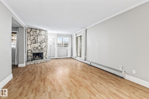 G7 10148 118 Street, Edmonton, AB - Indoor With Fireplace