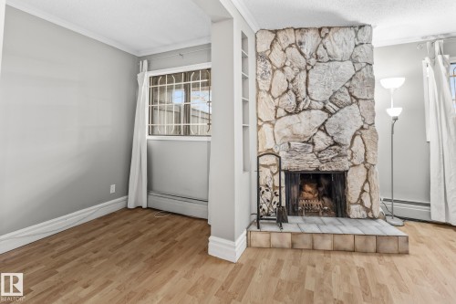 G7 10148 118 Street, Edmonton, AB - Indoor With Fireplace