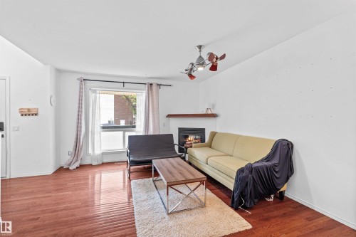 10516 108 Avenue, Edmonton, AB - Indoor Photo Showing Living Room With Fireplace