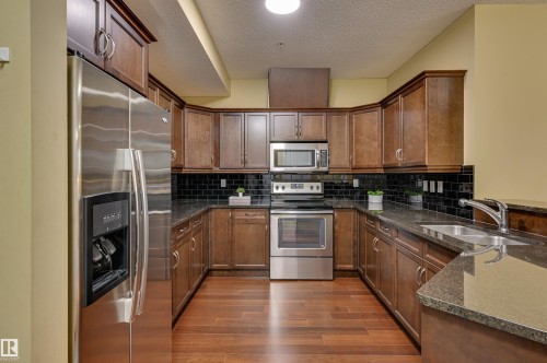 104 7907 109 Street, Edmonton, AB - Indoor Photo Showing Kitchen With Stainless Steel Kitchen With Double Sink