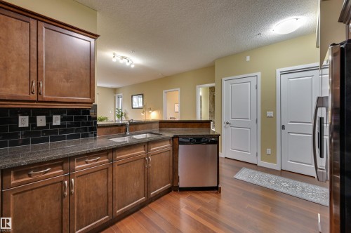 104 7907 109 Street, Edmonton, AB - Indoor Photo Showing Kitchen With Double Sink