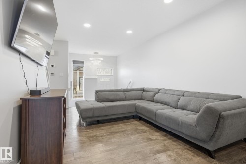 111 3305 Orchards Link, Edmonton, AB - Indoor Photo Showing Living Room
