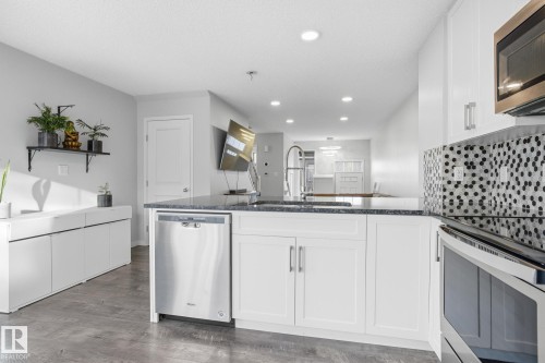 111 3305 Orchards Link, Edmonton, AB - Indoor Photo Showing Kitchen With Upgraded Kitchen