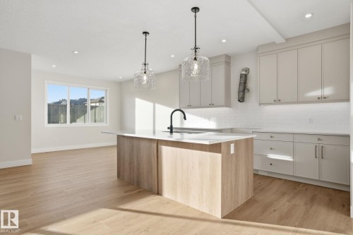 721 Astoria Way, Devon, AB - Indoor Photo Showing Kitchen With Upgraded Kitchen