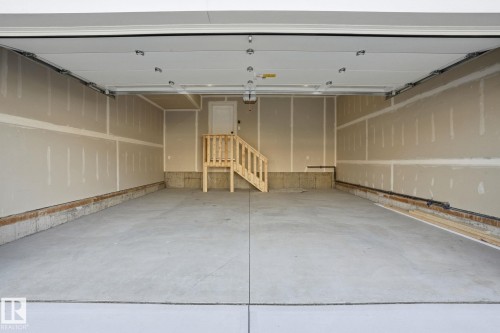 721 Astoria Way, Devon, AB - Indoor Photo Showing Garage