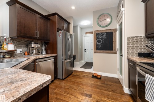 86 8602 Southfort Boulevard, Fort Saskatchewan, AB - Indoor Photo Showing Kitchen With Double Sink