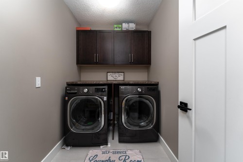 86 8602 Southfort Boulevard, Fort Saskatchewan, AB - Indoor Photo Showing Laundry Room