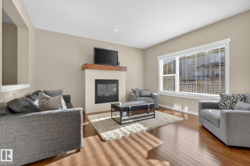 10 Codette Way, Sherwood Park, AB - Indoor Photo Showing Living Room With Fireplace