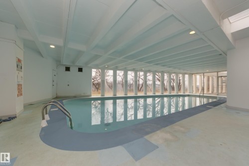 201 9908 114 Street, Edmonton, AB - Indoor Photo Showing Other Room With In Ground Pool