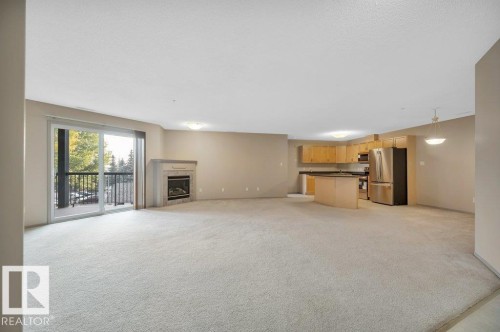 322 16303 95 Street, Edmonton, AB - Indoor With Fireplace