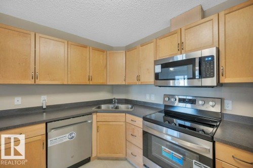 322 16303 95 Street, Edmonton, AB - Indoor Photo Showing Kitchen With Double Sink