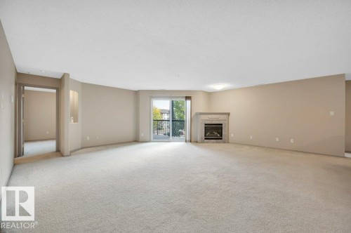 322 16303 95 Street, Edmonton, AB - Indoor With Fireplace