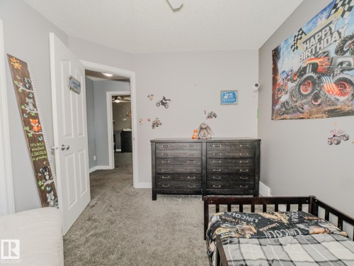 109 Rue Moreau, Beaumont, AB - Indoor Photo Showing Bedroom