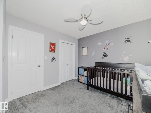 109 Rue Moreau, Beaumont, AB - Indoor Photo Showing Bedroom