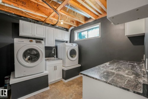5606 55 Street, Beaumont, AB - Indoor Photo Showing Laundry Room