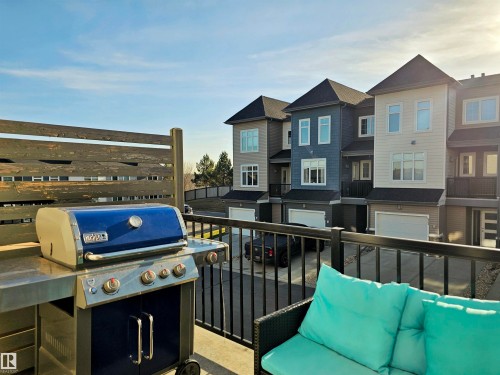 Balcony with area for grilling, a residential view, and an outdoor living space - 83 600 Bellerose Drive, St. Albert, AB - Outdoor