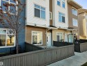 View of front of house with a residential view and a fenced front yard - 83 600 Bellerose Drive, St. Albert, AB  - Outdoor 