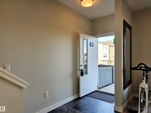 Entryway featuring baseboards - 83 600 Bellerose Drive, St. Albert, AB - Indoor Photo Showing Other Room