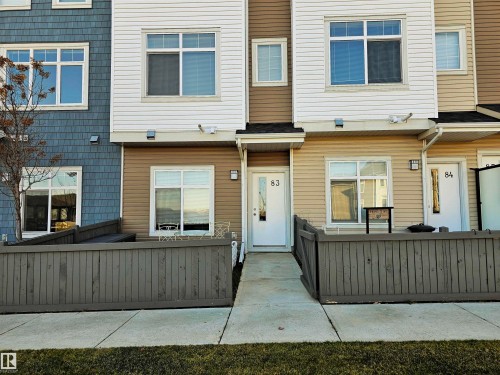 View of front of property featuring a fenced front yard - 83 600 Bellerose Drive, St. Albert, AB - Outdoor With Exterior