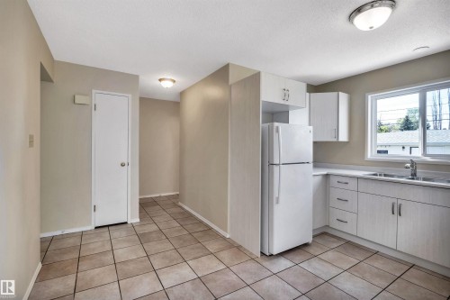 10228 152 Street, Edmonton, AB - Indoor Photo Showing Kitchen With Double Sink