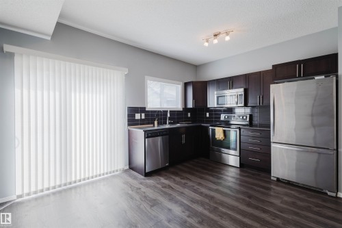 9 6520 2 Avenue, Edmonton, AB - Indoor Photo Showing Kitchen With Stainless Steel Kitchen